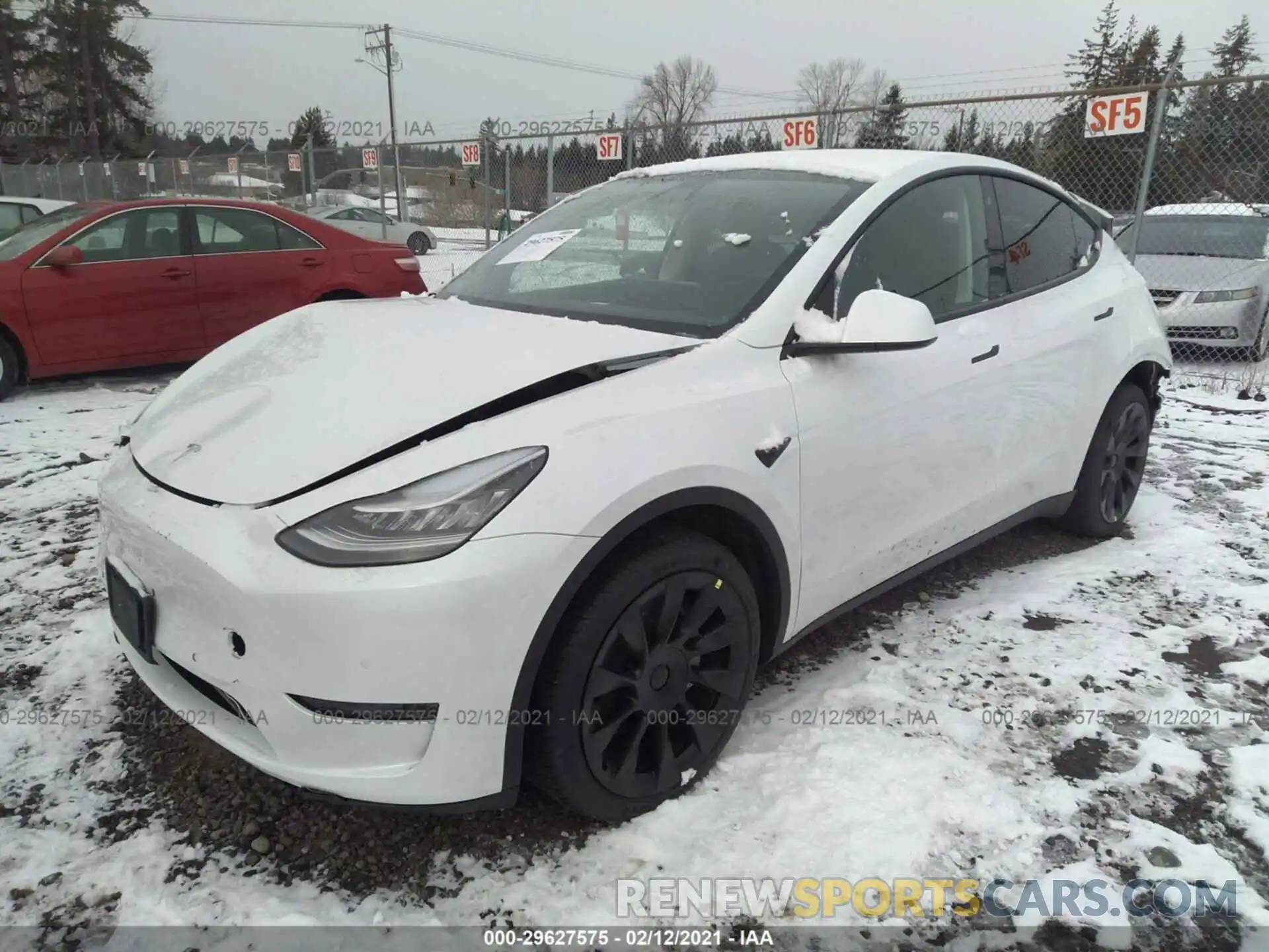 2 Photograph of a damaged car 5YJYGDEE9LF058334 TESLA MODEL Y 2020