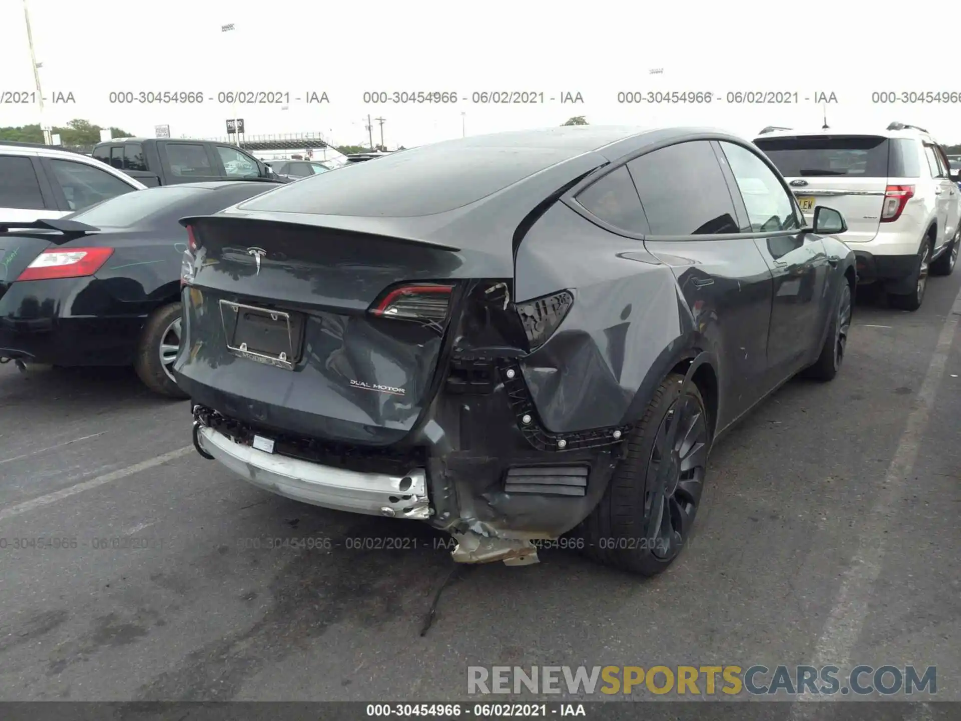 4 Photograph of a damaged car 5YJYGDEF0LF046856 TESLA MODEL Y 2020