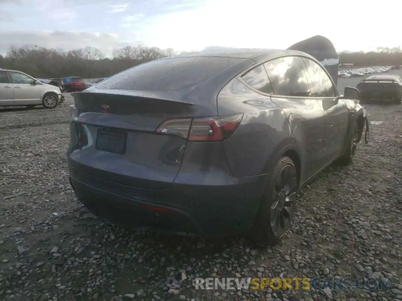 4 Photograph of a damaged car 5YJYGDEF1LF001411 TESLA MODEL Y 2020