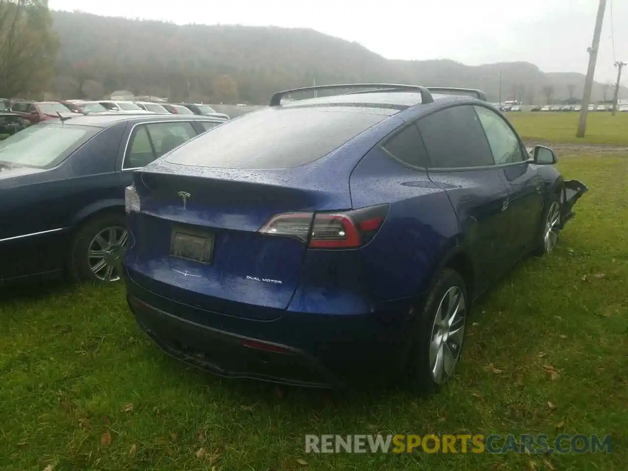 4 Photograph of a damaged car 5YJYGDEF2LF002258 TESLA MODEL Y 2020