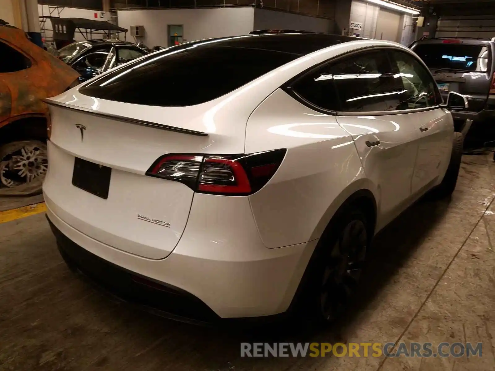 4 Photograph of a damaged car 5YJYGDEF2LF046809 TESLA MODEL Y 2020