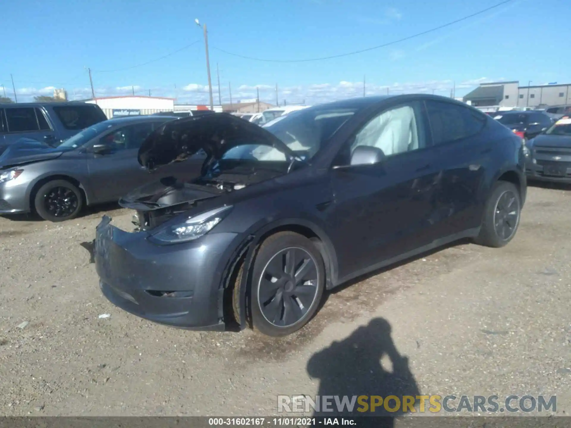 2 Photograph of a damaged car 5YJYGDEF7LF005821 TESLA MODEL Y 2020