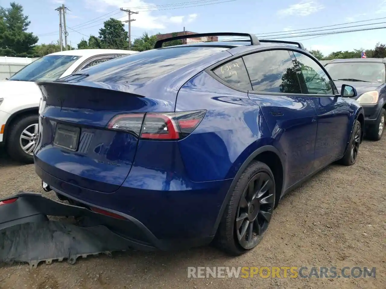 4 Photograph of a damaged car 5YJYGDEF8LF001065 TESLA MODEL Y 2020