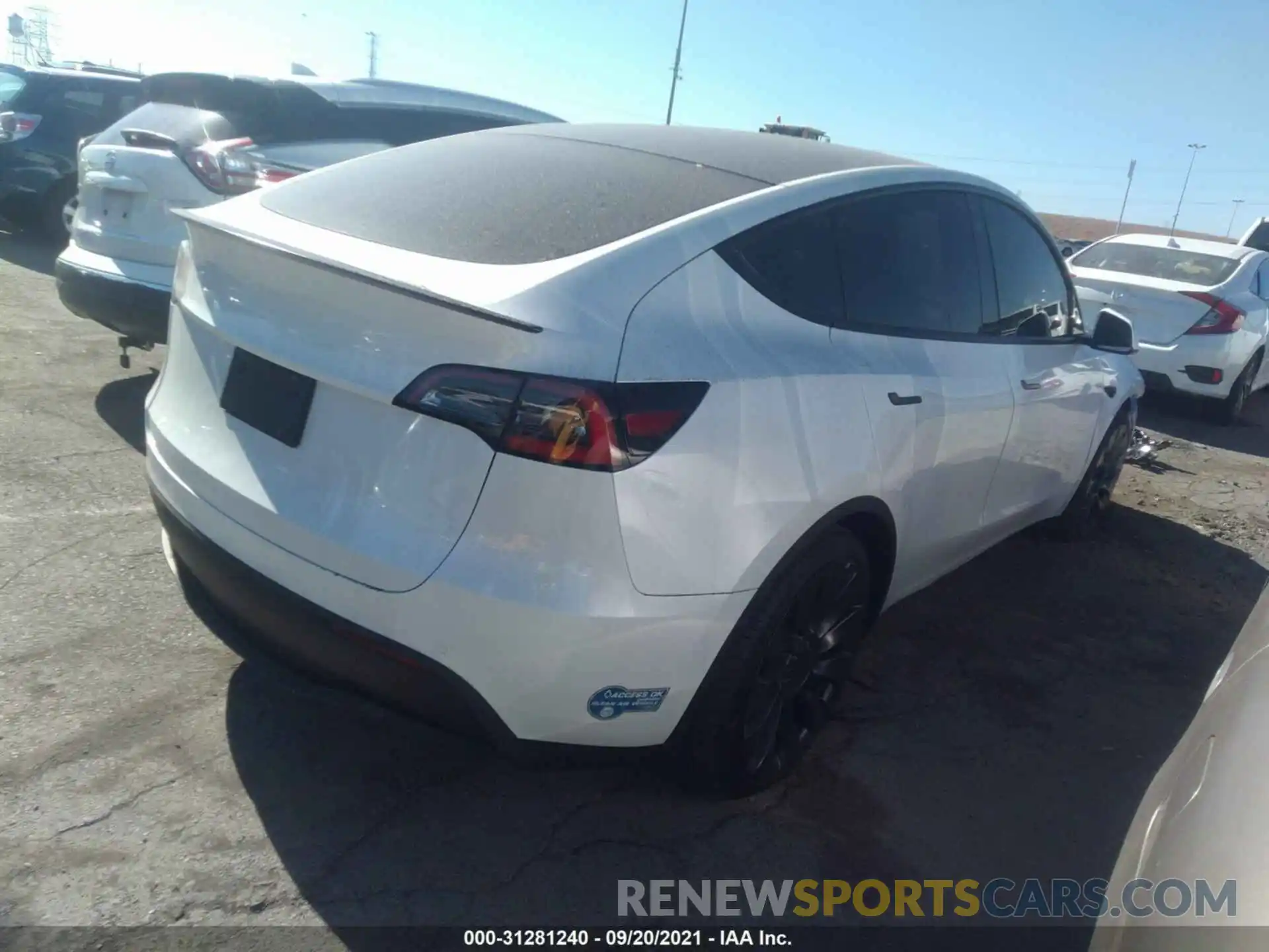 4 Photograph of a damaged car 5YJYGDEF9LF058861 TESLA MODEL Y 2020