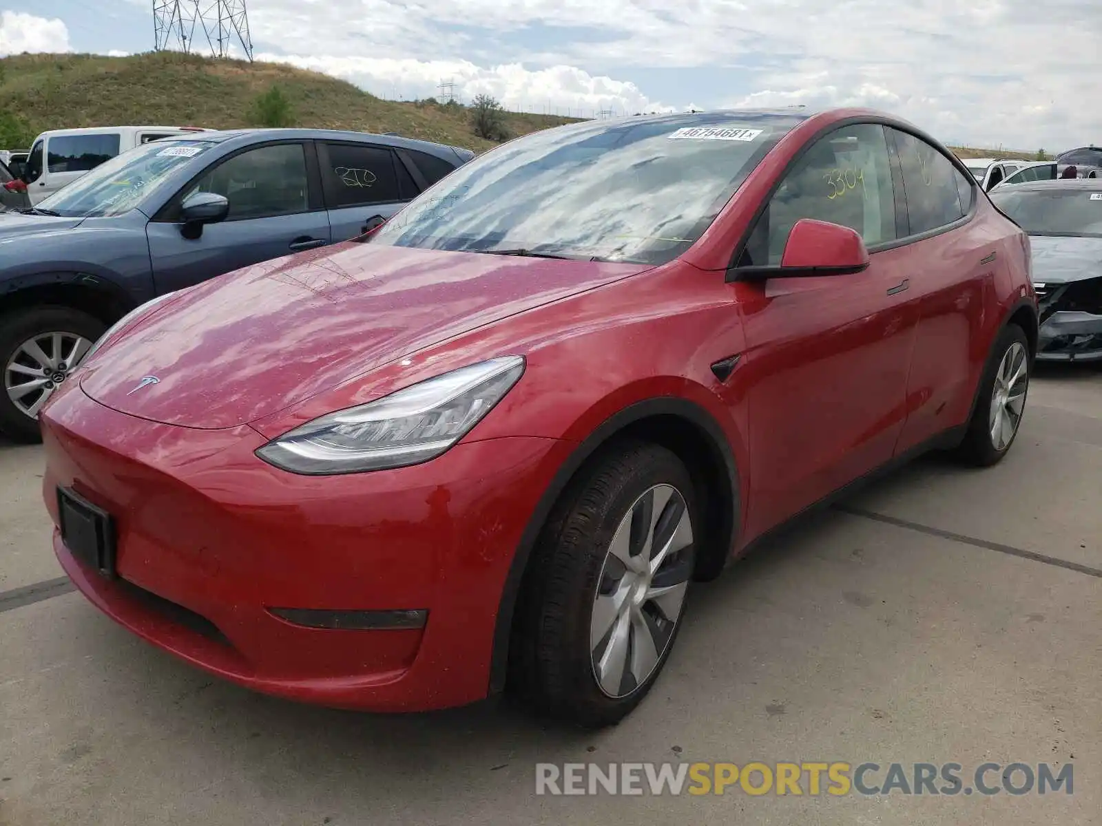 2 Photograph of a damaged car 5YJYGAED2MF142681 TESLA MODEL Y 2021