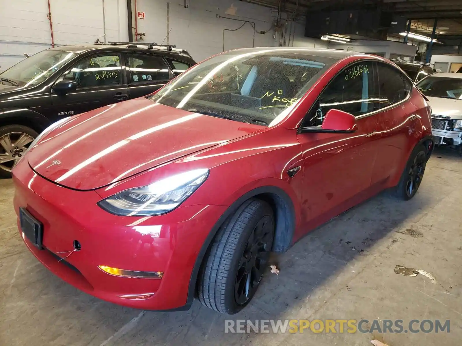 2 Photograph of a damaged car 5YJYGAED4MF115899 TESLA MODEL Y 2021