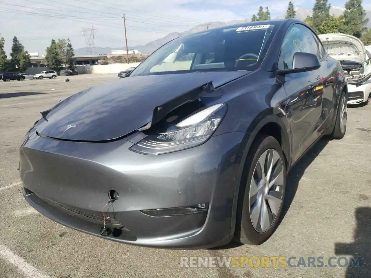 2 Photograph of a damaged car 5YJYGAED5MF181572 TESLA MODEL Y 2021