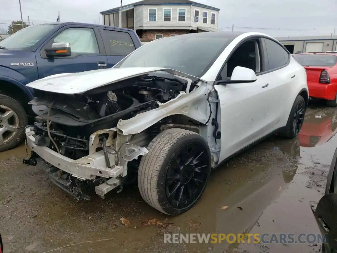 2 Photograph of a damaged car 5YJYGAEE0MF142929 TESLA MODEL Y 2021