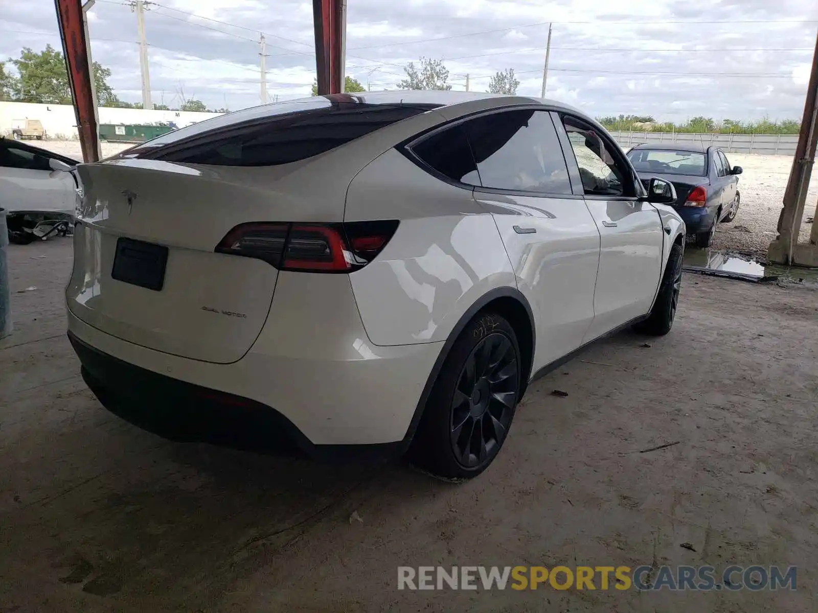 4 Photograph of a damaged car 5YJYGAEE0MF187644 TESLA MODEL Y 2021