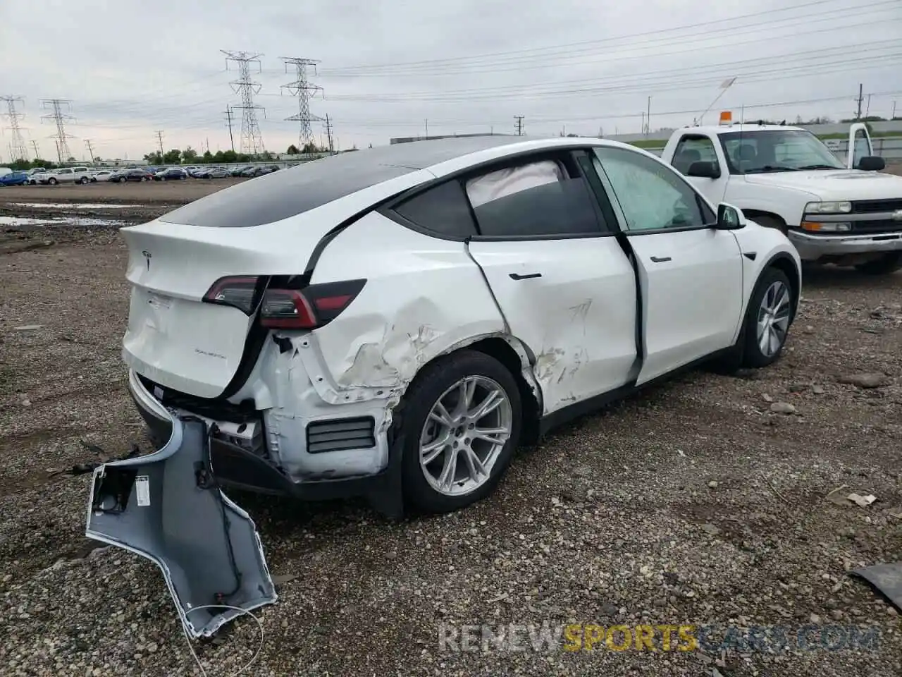 4 Photograph of a damaged car 5YJYGAEE0MF203339 TESLA MODEL Y 2021