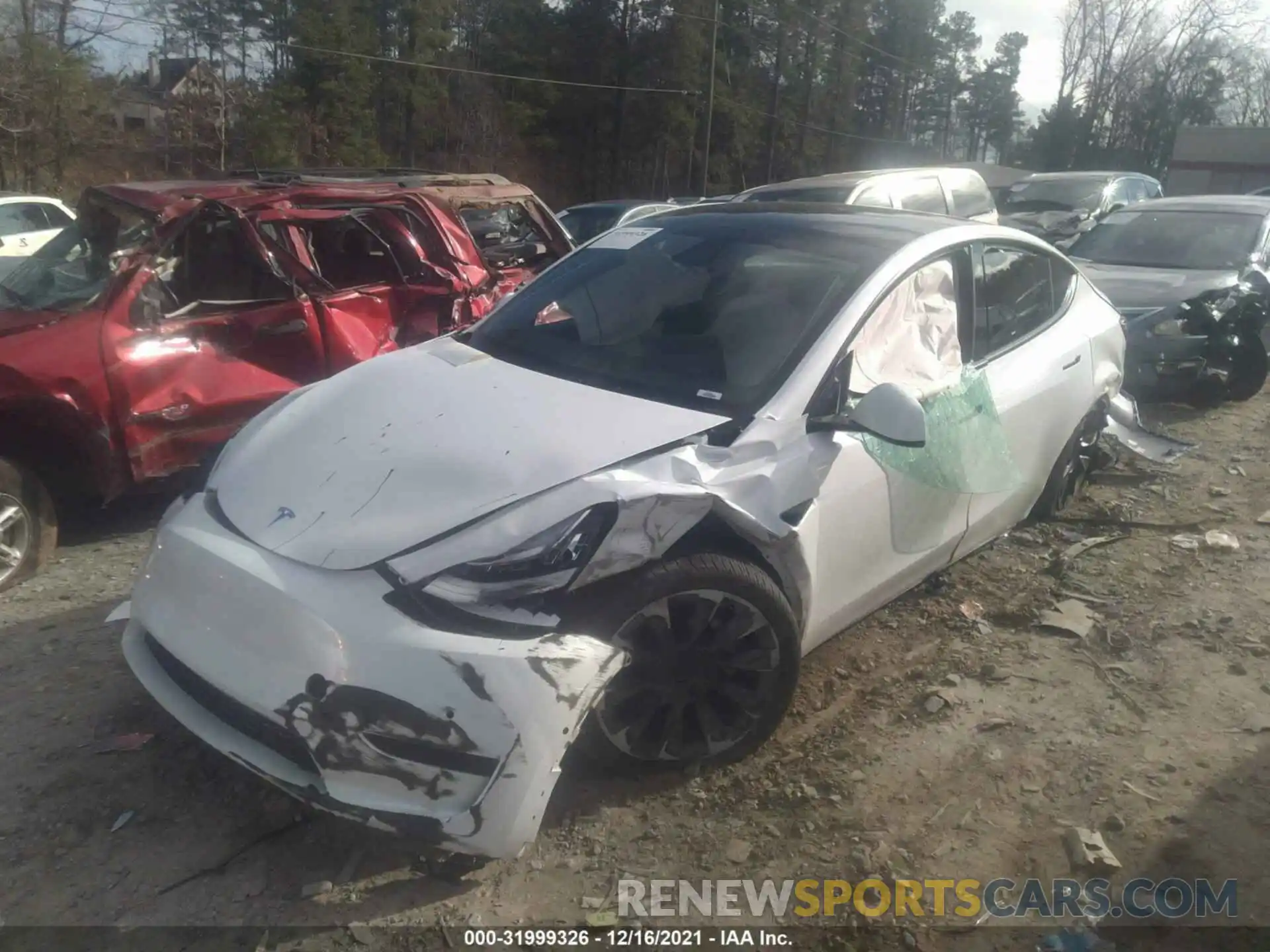 2 Photograph of a damaged car 5YJYGAEE0MF261208 TESLA MODEL Y 2021