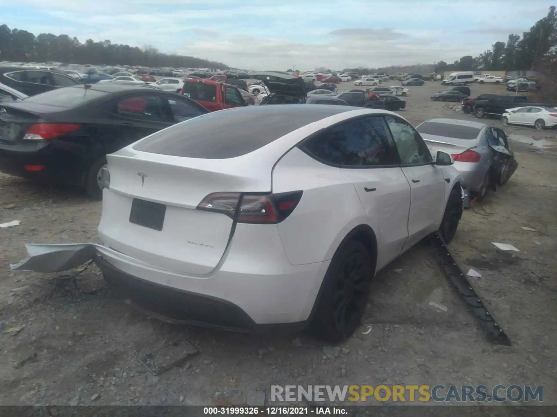 4 Photograph of a damaged car 5YJYGAEE0MF261208 TESLA MODEL Y 2021