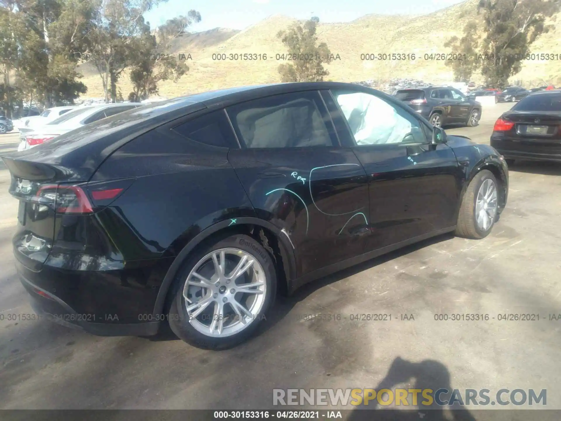 4 Photograph of a damaged car 5YJYGAEE1MF157603 TESLA MODEL Y 2021