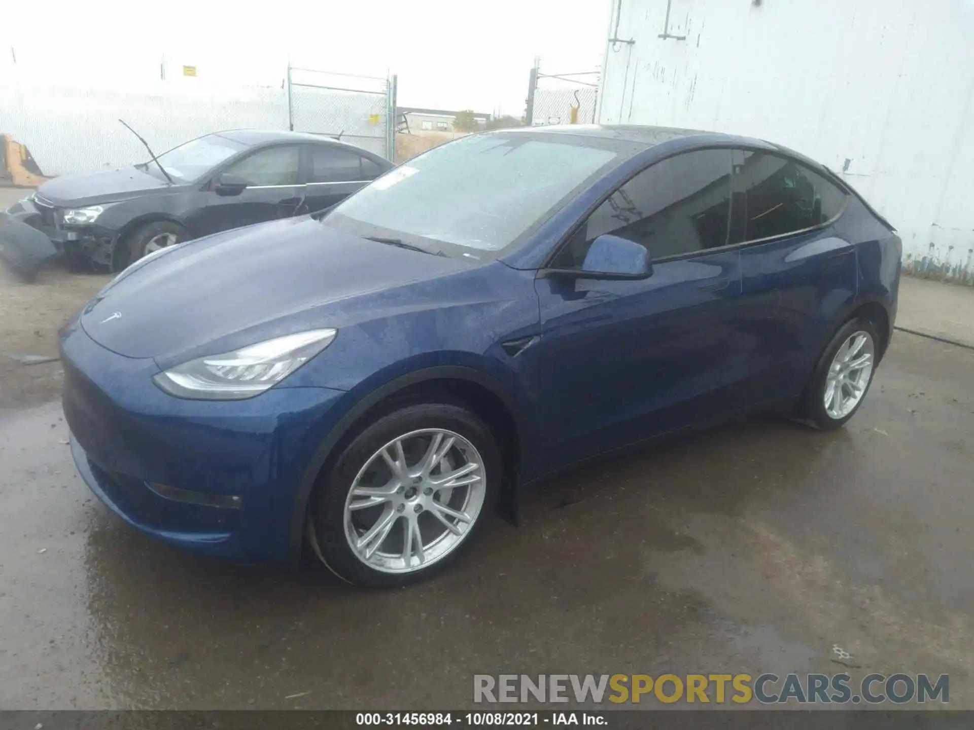 2 Photograph of a damaged car 5YJYGAEE1MF173879 TESLA MODEL Y 2021