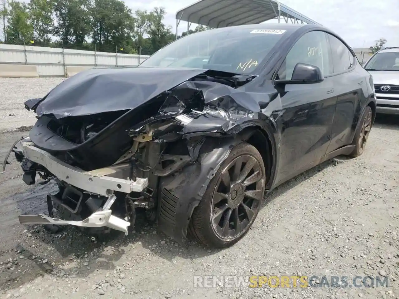 2 Photograph of a damaged car 5YJYGAEE1MF194084 TESLA MODEL Y 2021