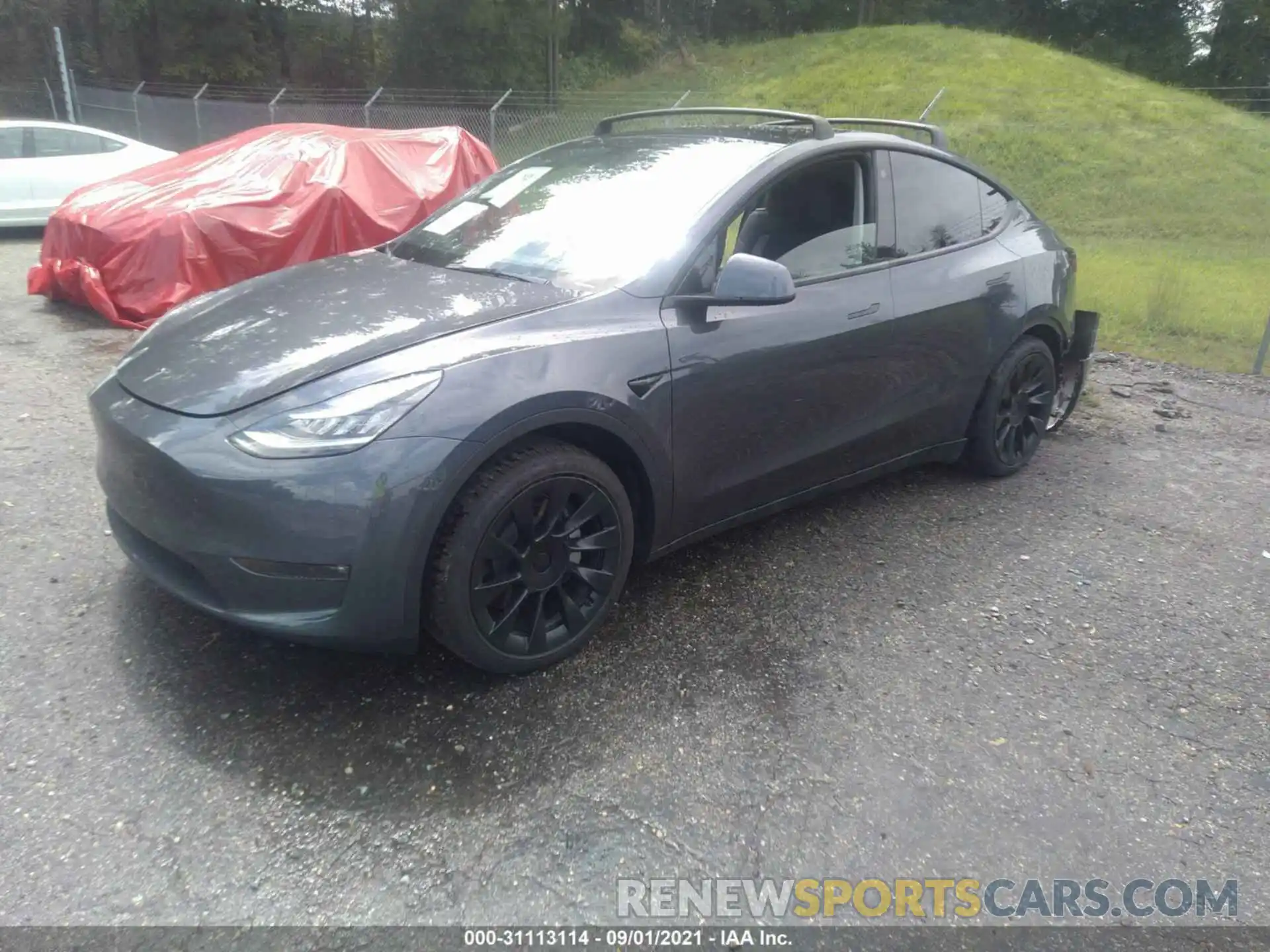 2 Photograph of a damaged car 5YJYGAEE2MF137778 TESLA MODEL Y 2021