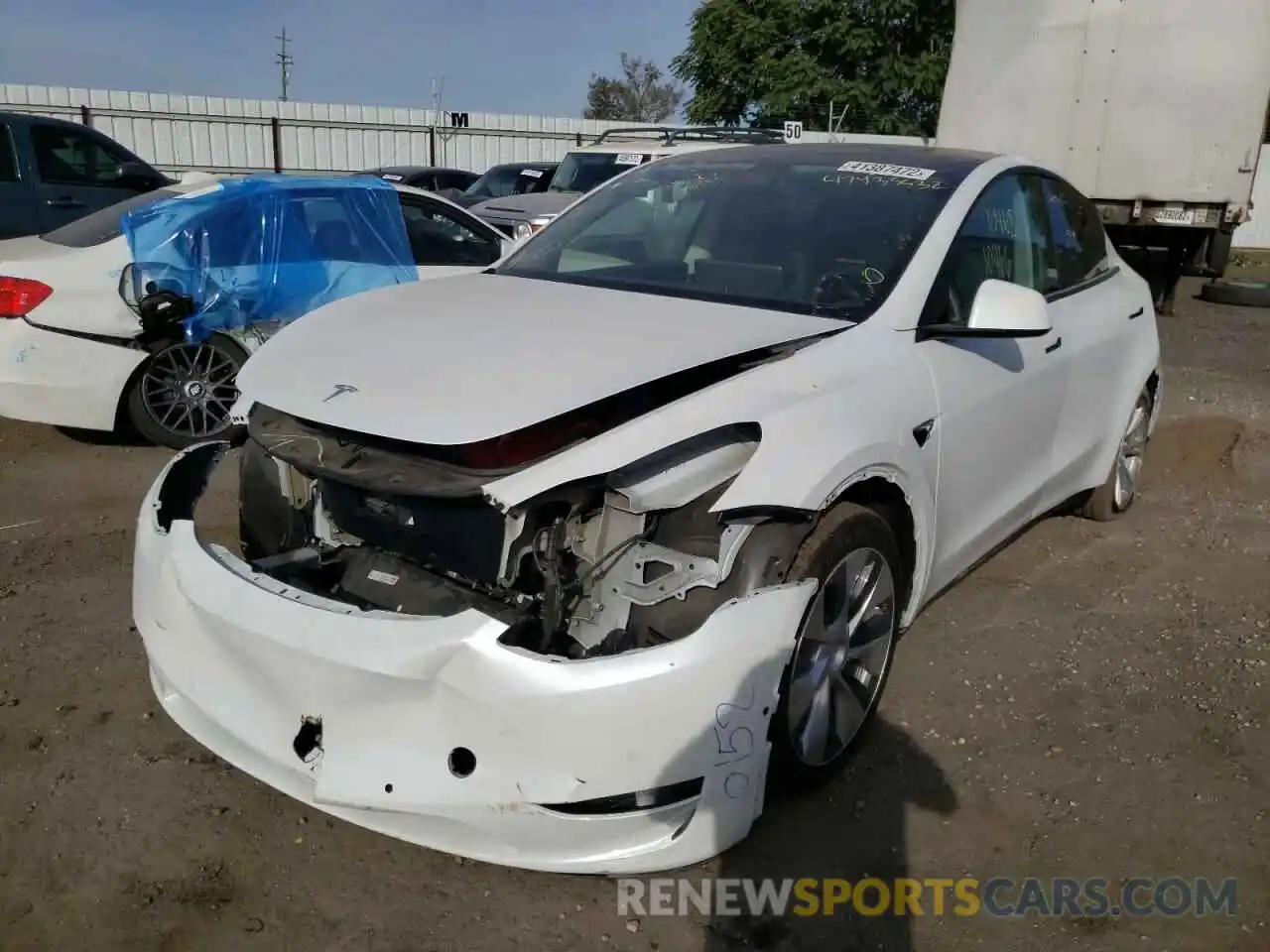 2 Photograph of a damaged car 5YJYGAEE2MF150031 TESLA MODEL Y 2021