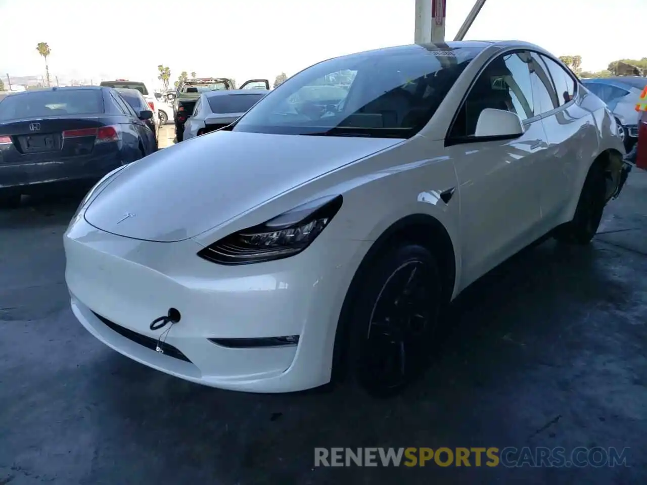 2 Photograph of a damaged car 5YJYGAEE2MF179948 TESLA MODEL Y 2021