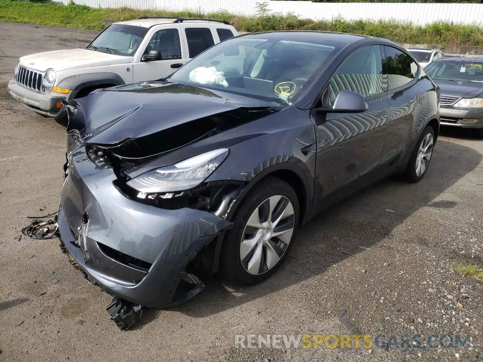 2 Photograph of a damaged car 5YJYGAEE2MF181229 TESLA MODEL Y 2021