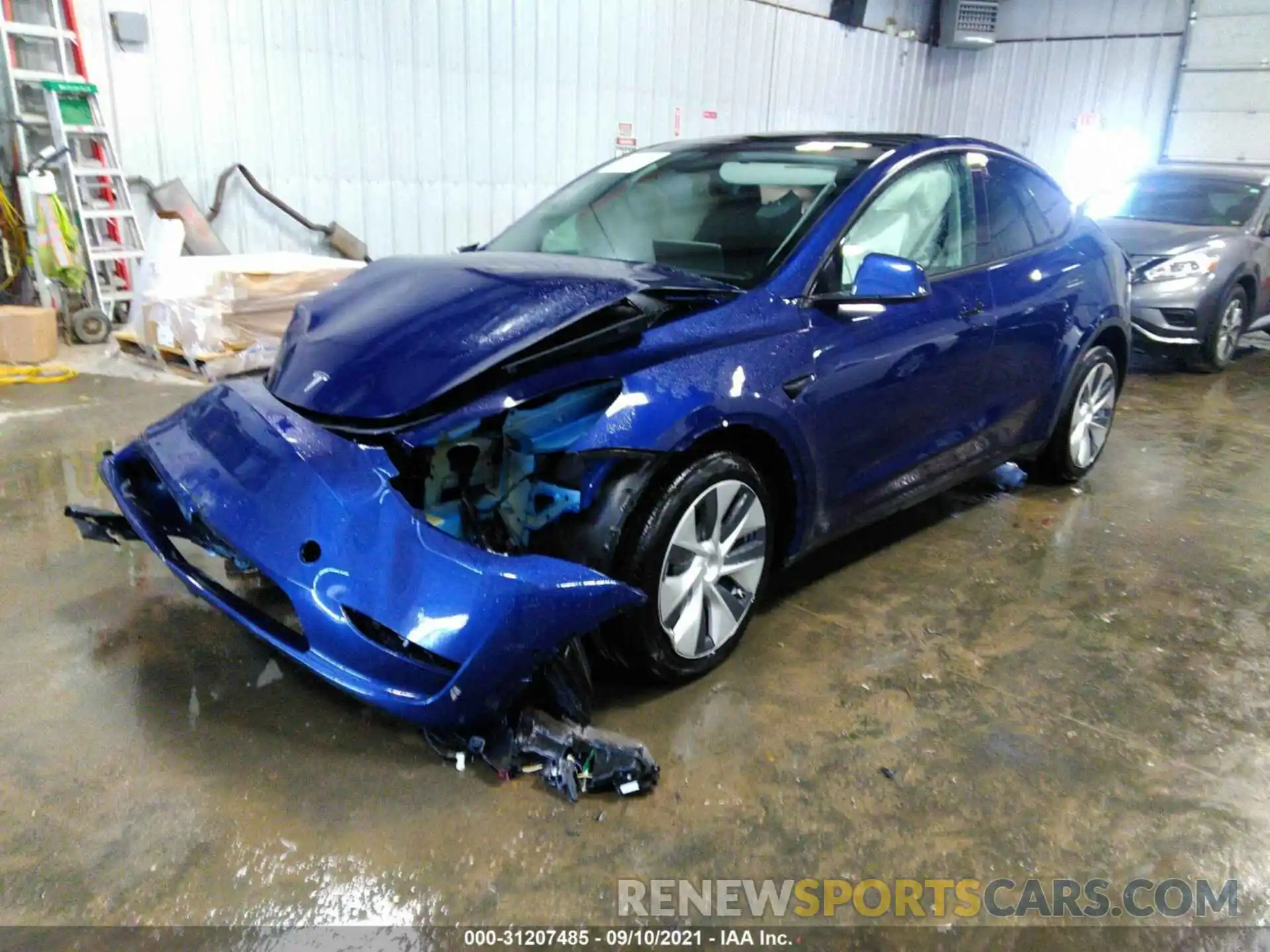 2 Photograph of a damaged car 5YJYGAEE2MF192893 TESLA MODEL Y 2021