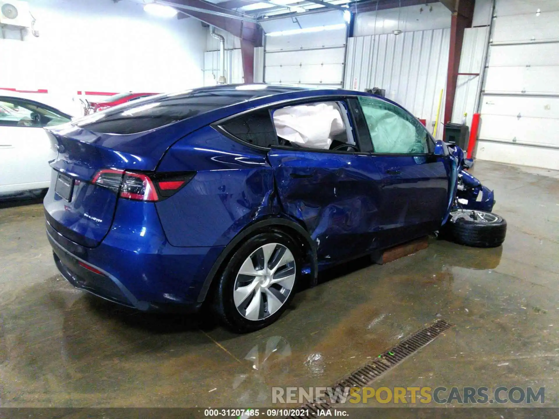 4 Photograph of a damaged car 5YJYGAEE2MF192893 TESLA MODEL Y 2021