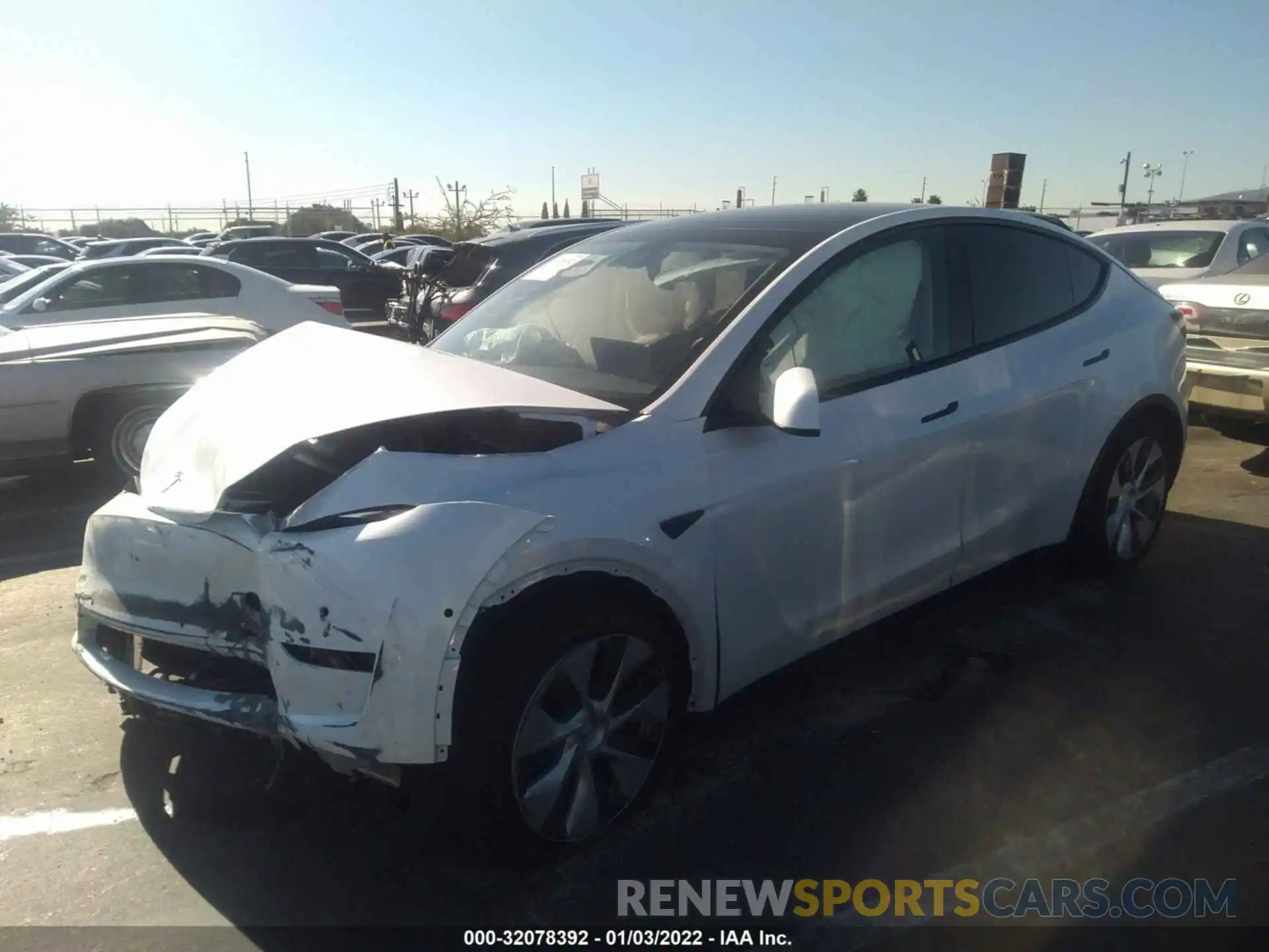 2 Photograph of a damaged car 5YJYGAEE2MF217081 TESLA MODEL Y 2021