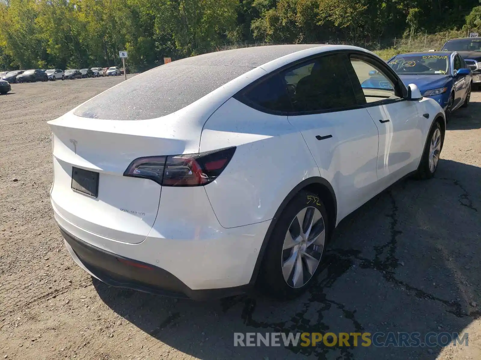 4 Photograph of a damaged car 5YJYGAEE3MF145923 TESLA MODEL Y 2021