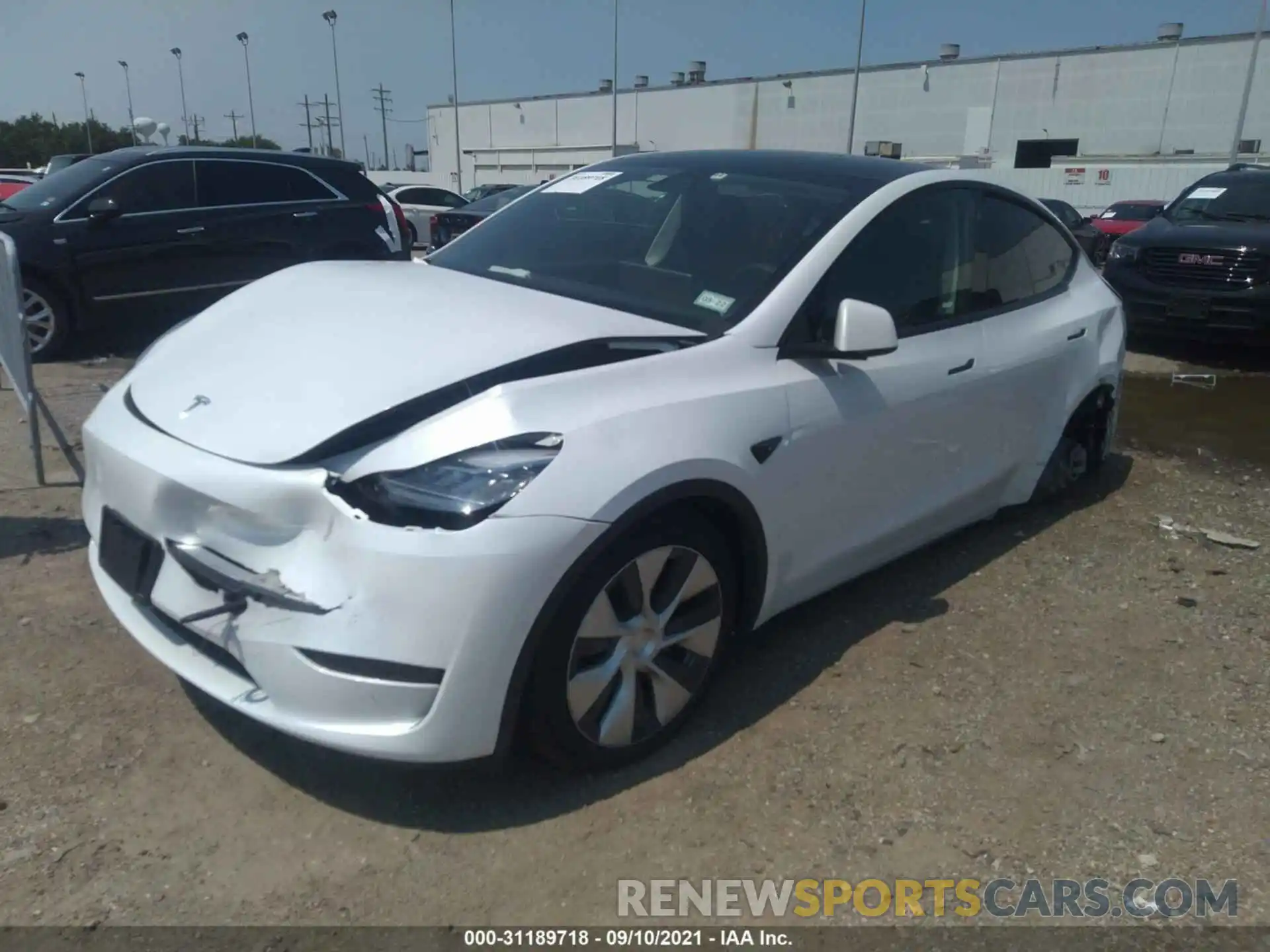 2 Photograph of a damaged car 5YJYGAEE3MF180994 TESLA MODEL Y 2021