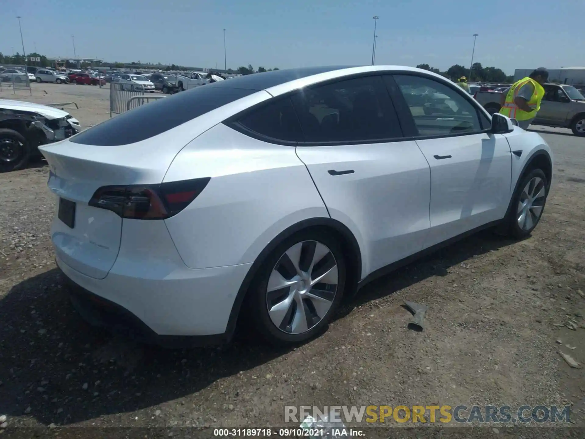 4 Photograph of a damaged car 5YJYGAEE3MF180994 TESLA MODEL Y 2021