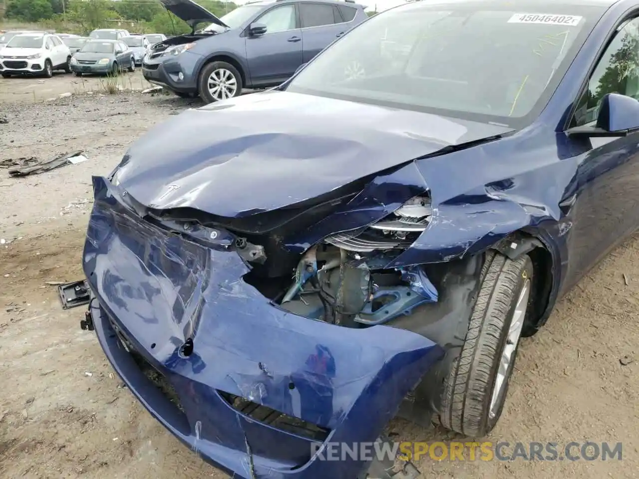 9 Photograph of a damaged car 5YJYGAEE4MF142562 TESLA MODEL Y 2021