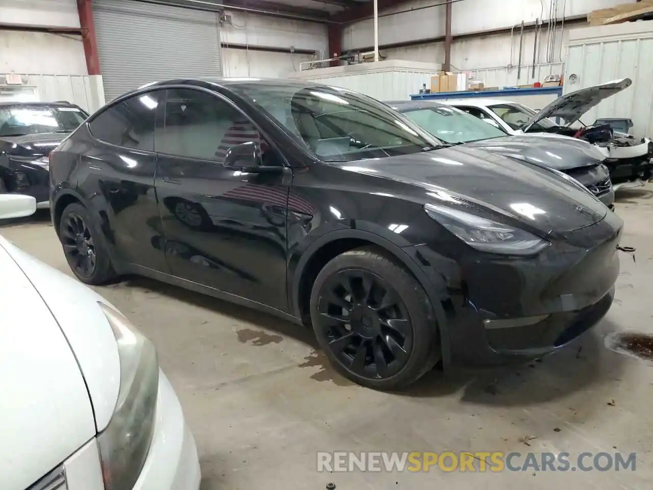 4 Photograph of a damaged car 5YJYGAEE4MF262944 TESLA MODEL Y 2021