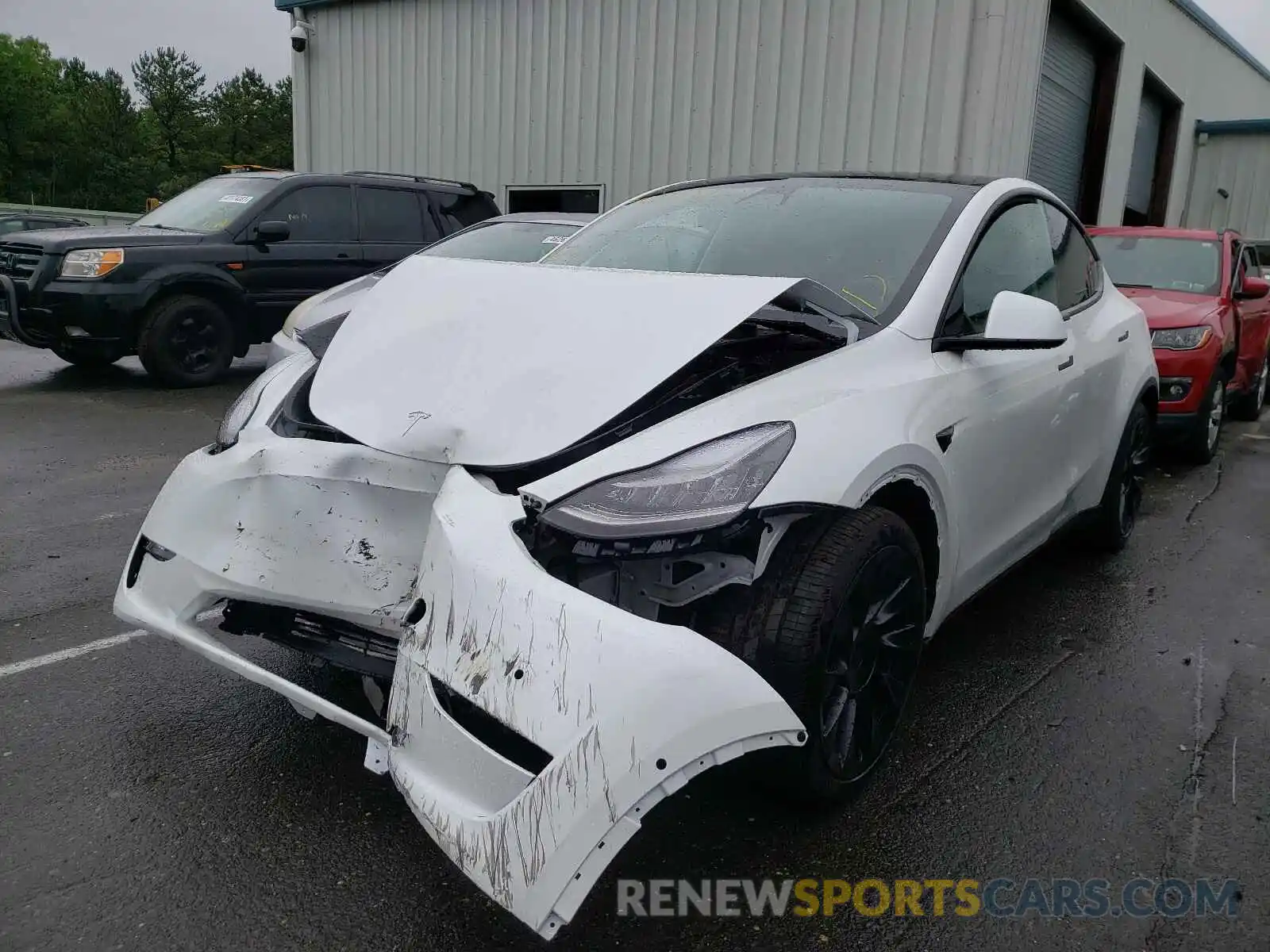 2 Photograph of a damaged car 5YJYGAEE5MF136723 TESLA MODEL Y 2021