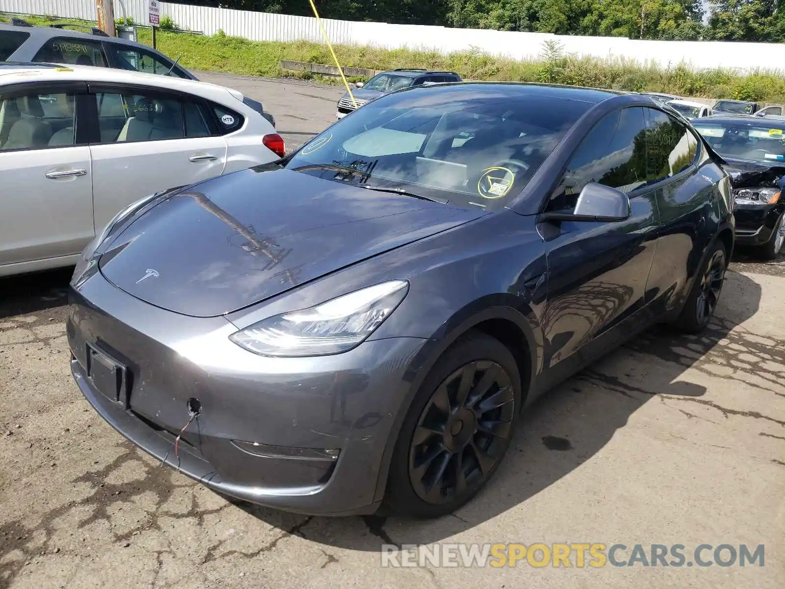 2 Photograph of a damaged car 5YJYGAEE5MF142845 TESLA MODEL Y 2021