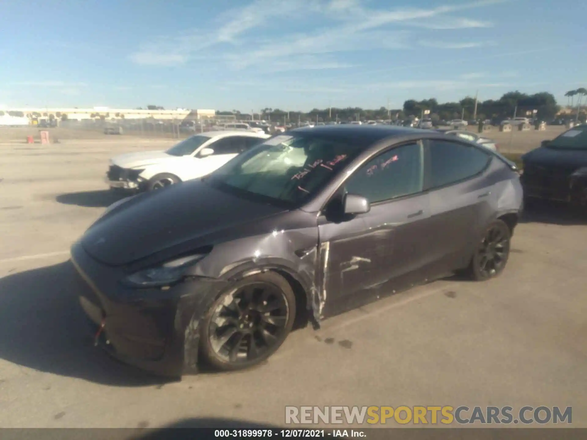 2 Photograph of a damaged car 5YJYGAEE5MF183718 TESLA MODEL Y 2021