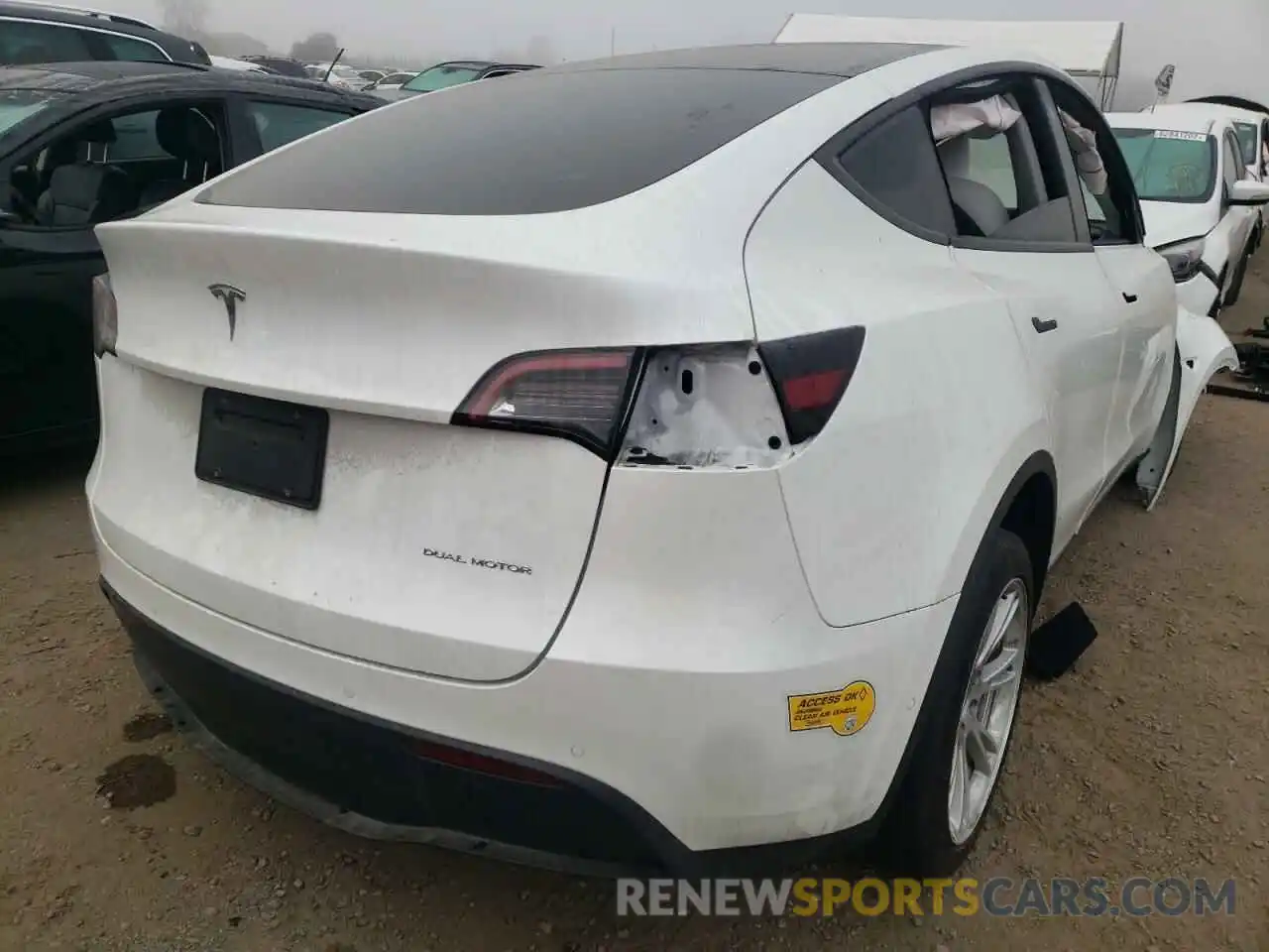 4 Photograph of a damaged car 5YJYGAEE5MF197599 TESLA MODEL Y 2021