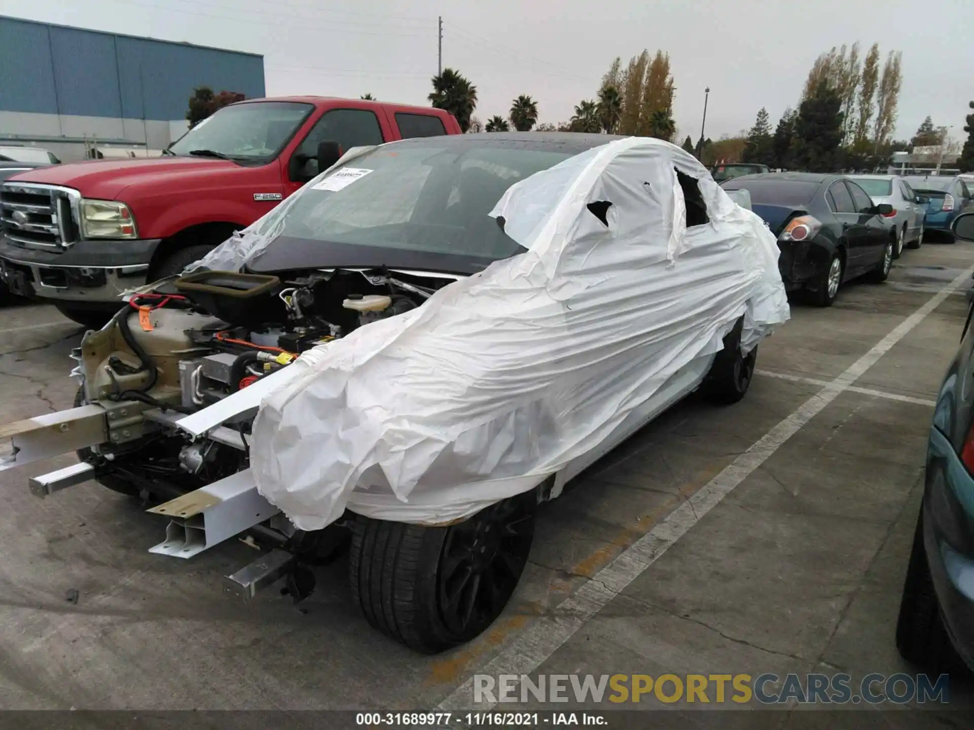 2 Photograph of a damaged car 5YJYGAEE5MF219052 TESLA MODEL Y 2021