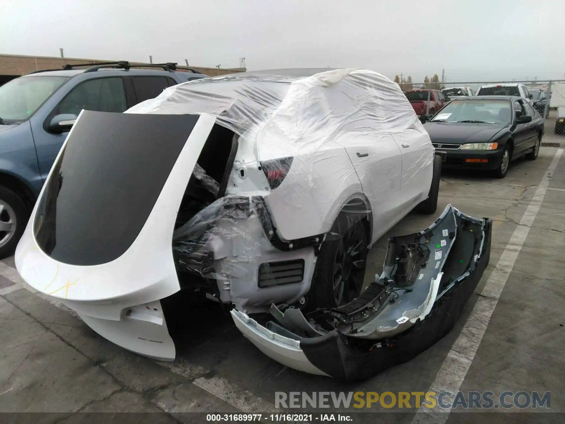 4 Photograph of a damaged car 5YJYGAEE5MF219052 TESLA MODEL Y 2021