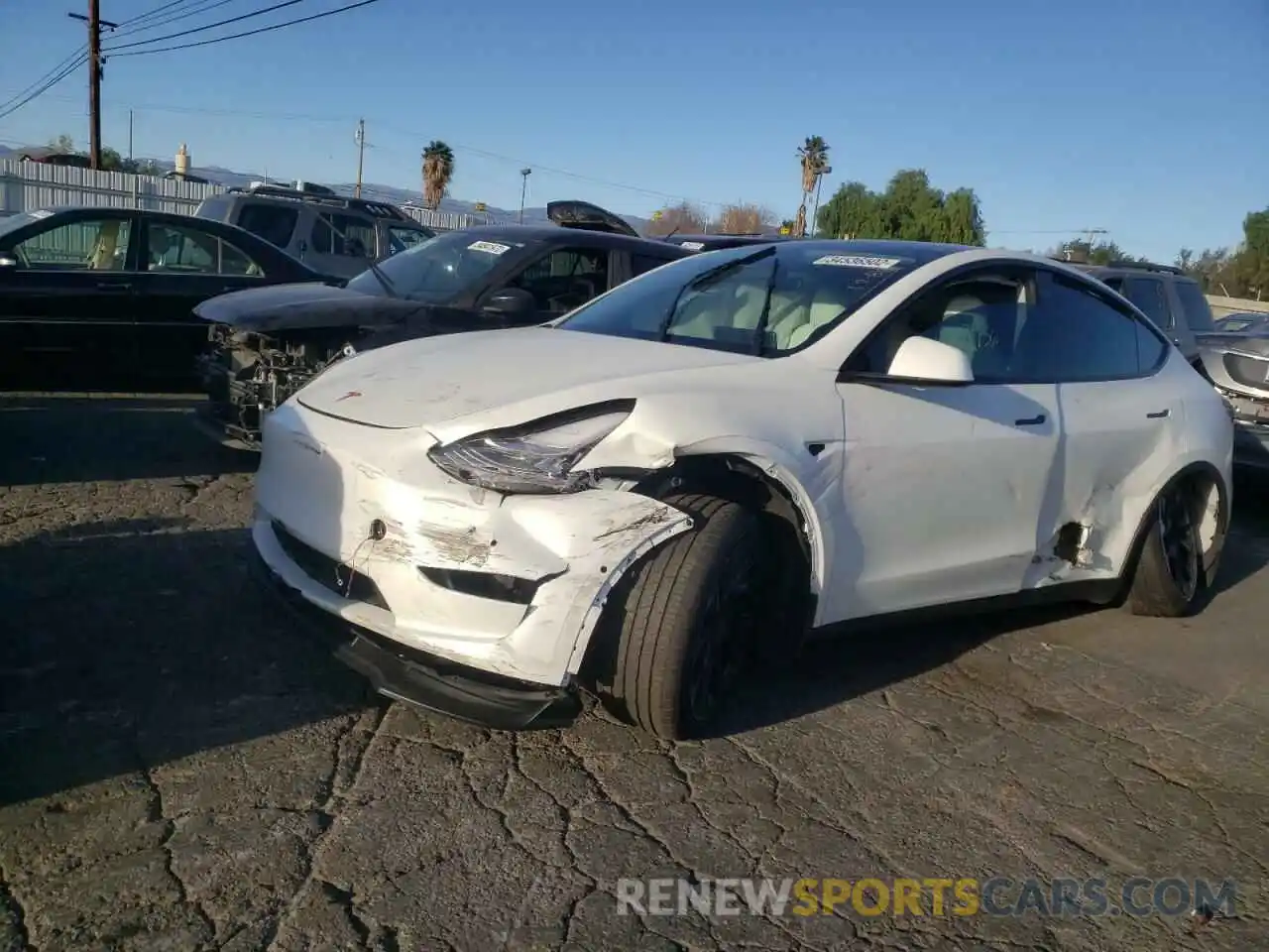 2 Photograph of a damaged car 5YJYGAEE5MF247238 TESLA MODEL Y 2021