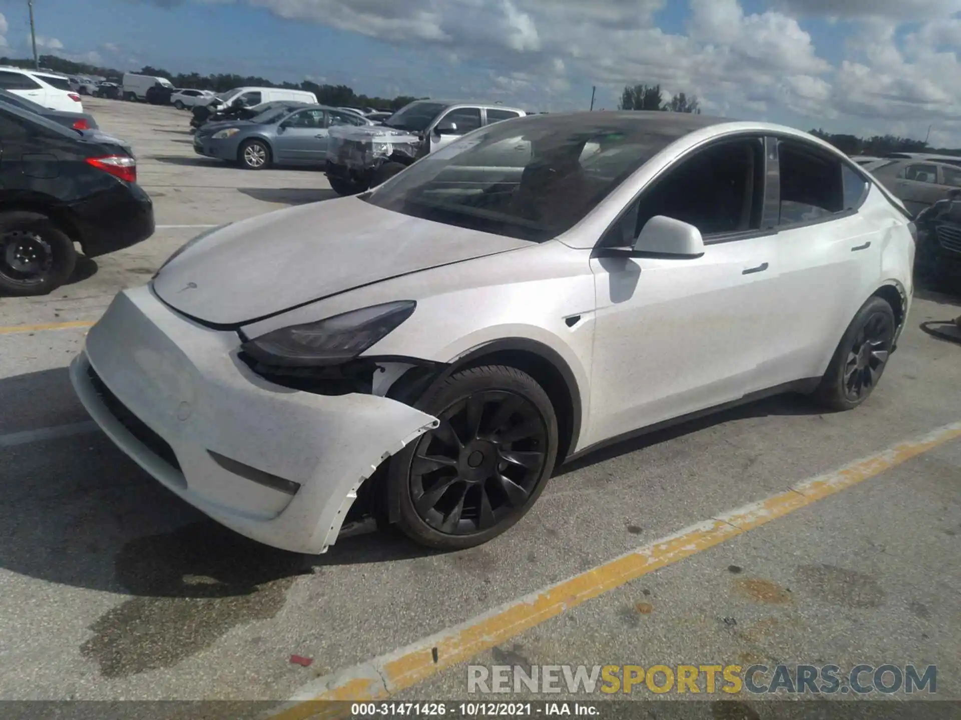 2 Photograph of a damaged car 5YJYGAEE5MF255677 TESLA MODEL Y 2021