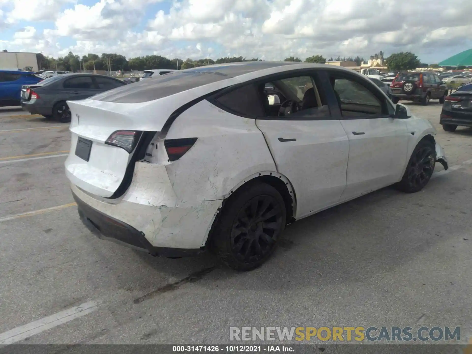 4 Photograph of a damaged car 5YJYGAEE5MF255677 TESLA MODEL Y 2021