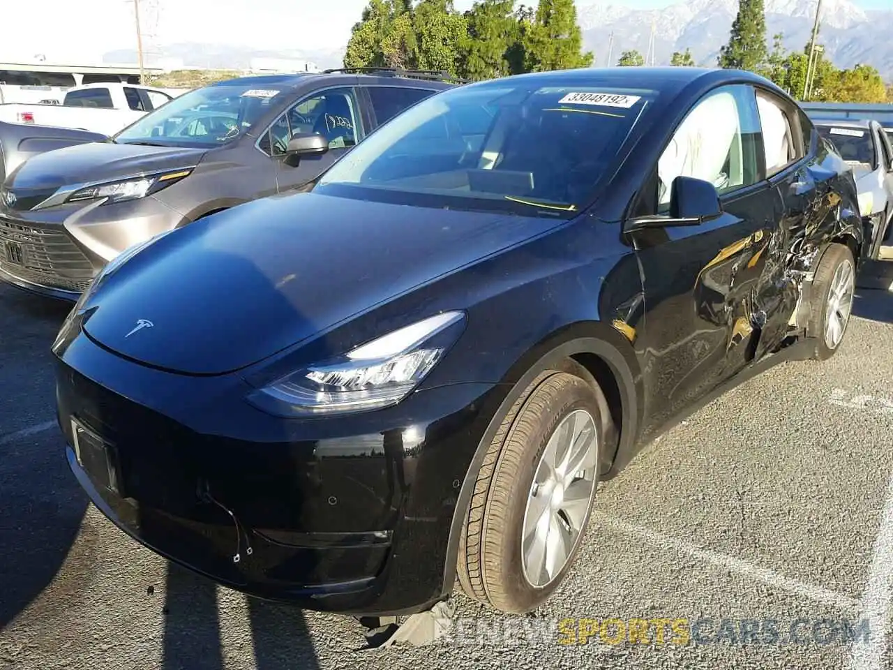 2 Photograph of a damaged car 5YJYGAEE5MF295614 TESLA MODEL Y 2021