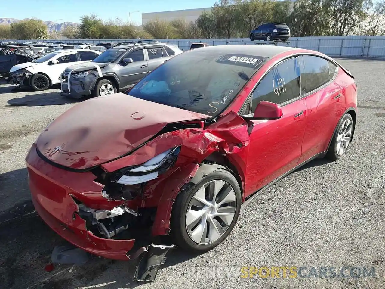 2 Photograph of a damaged car 5YJYGAEE6MF144765 TESLA MODEL Y 2021