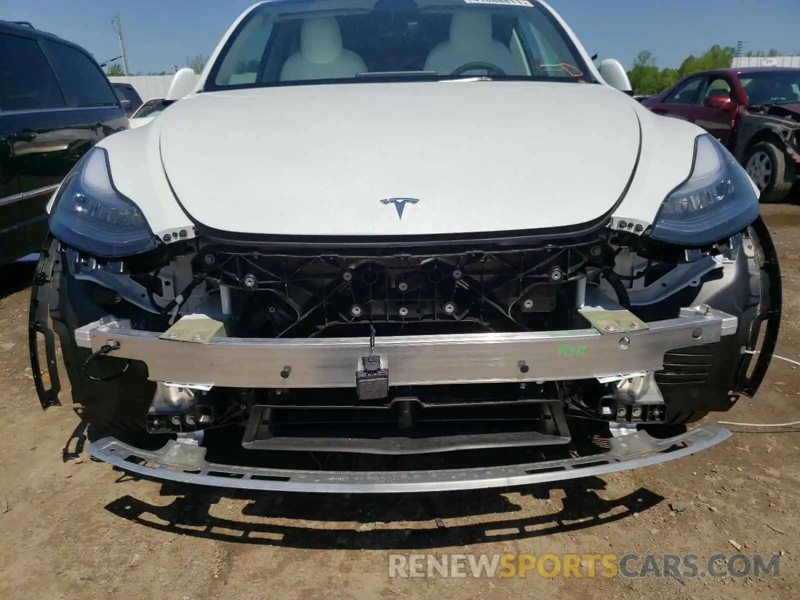 9 Photograph of a damaged car 5YJYGAEE7MF136867 TESLA MODEL Y 2021