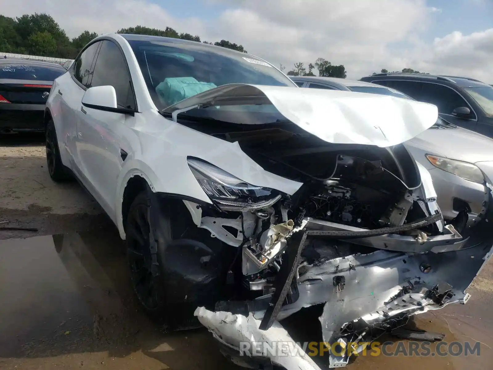 1 Photograph of a damaged car 5YJYGAEE7MF207663 TESLA MODEL Y 2021