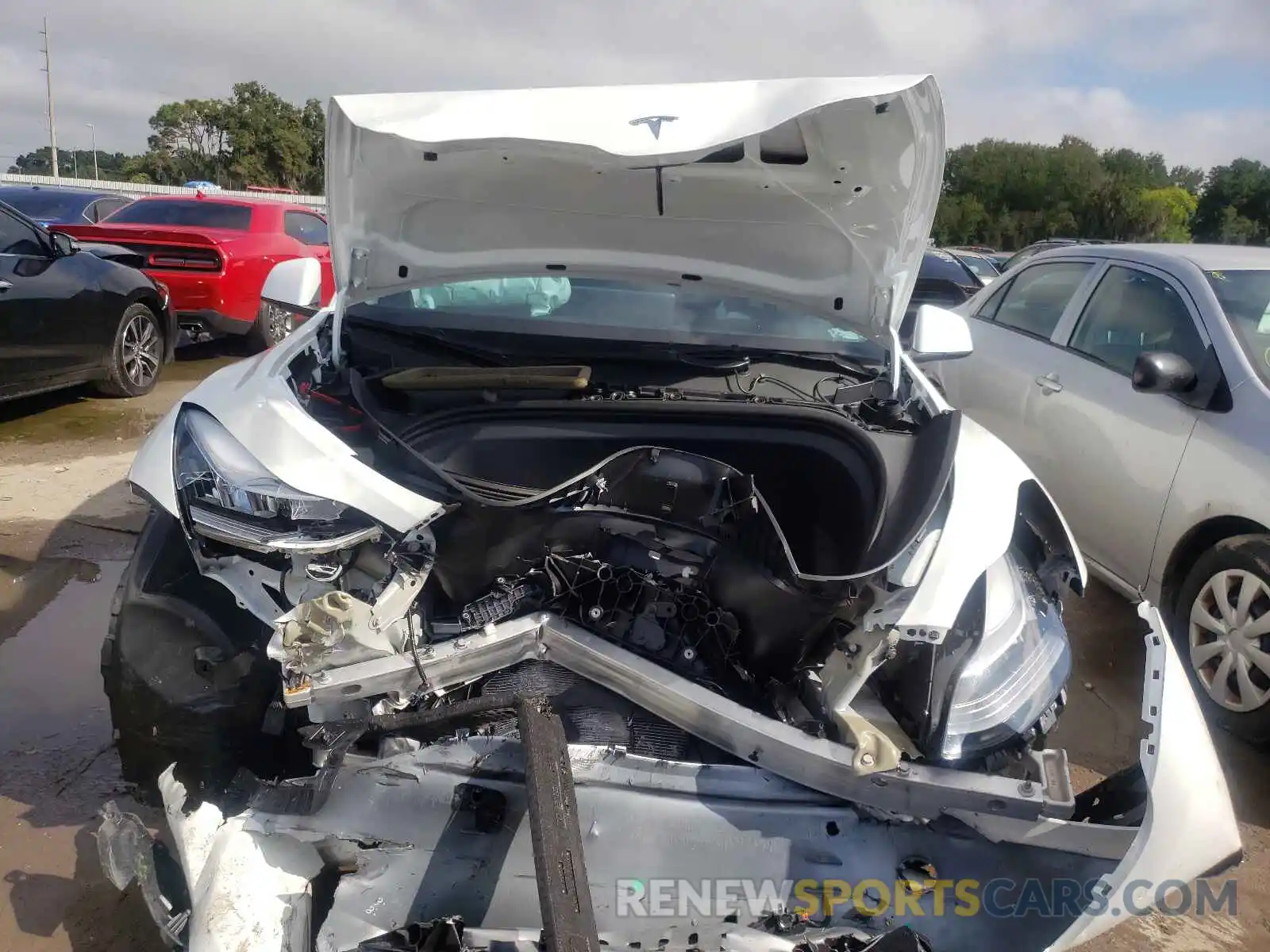 9 Photograph of a damaged car 5YJYGAEE7MF207663 TESLA MODEL Y 2021