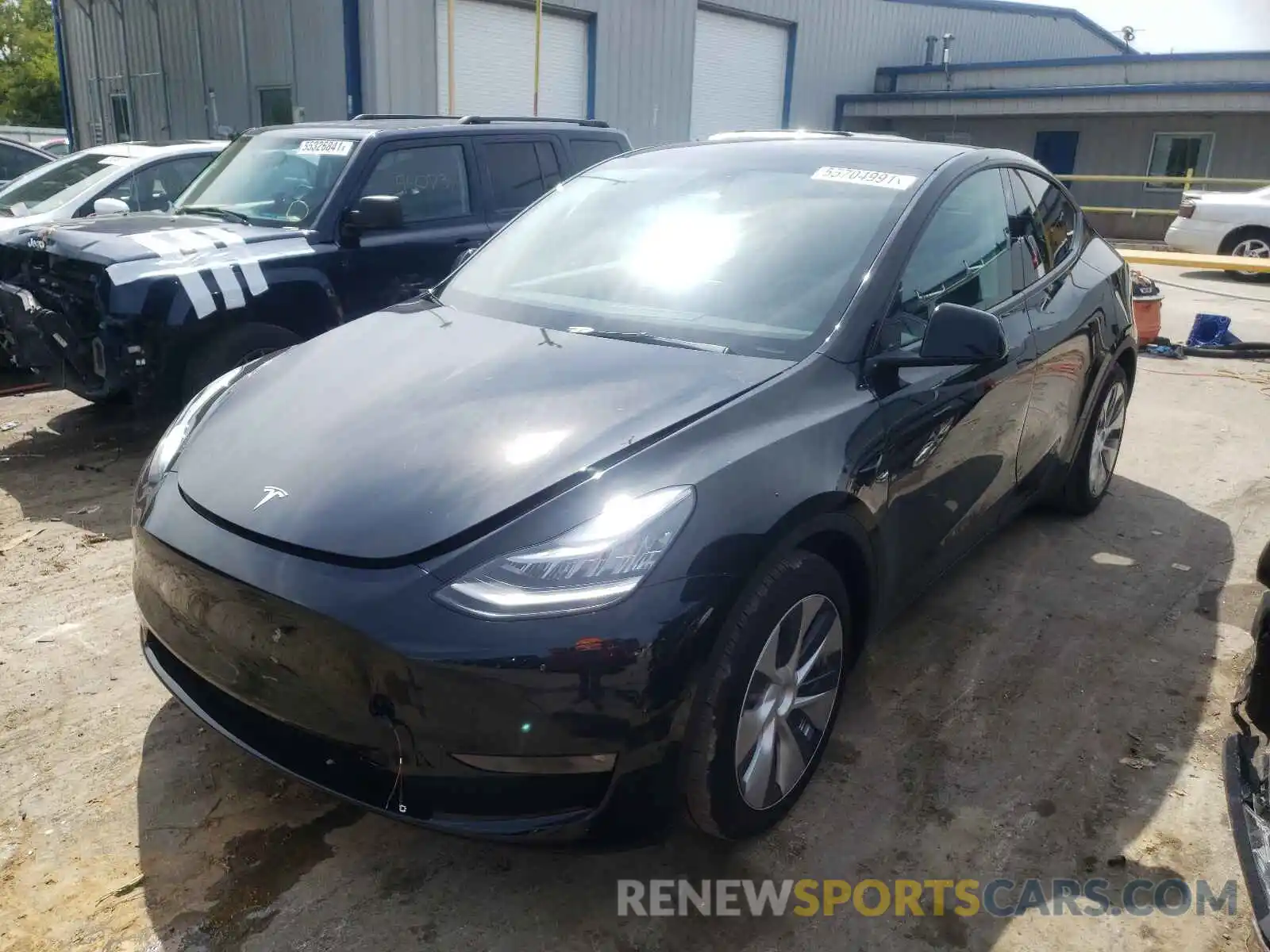 2 Photograph of a damaged car 5YJYGAEE8MF112593 TESLA MODEL Y 2021