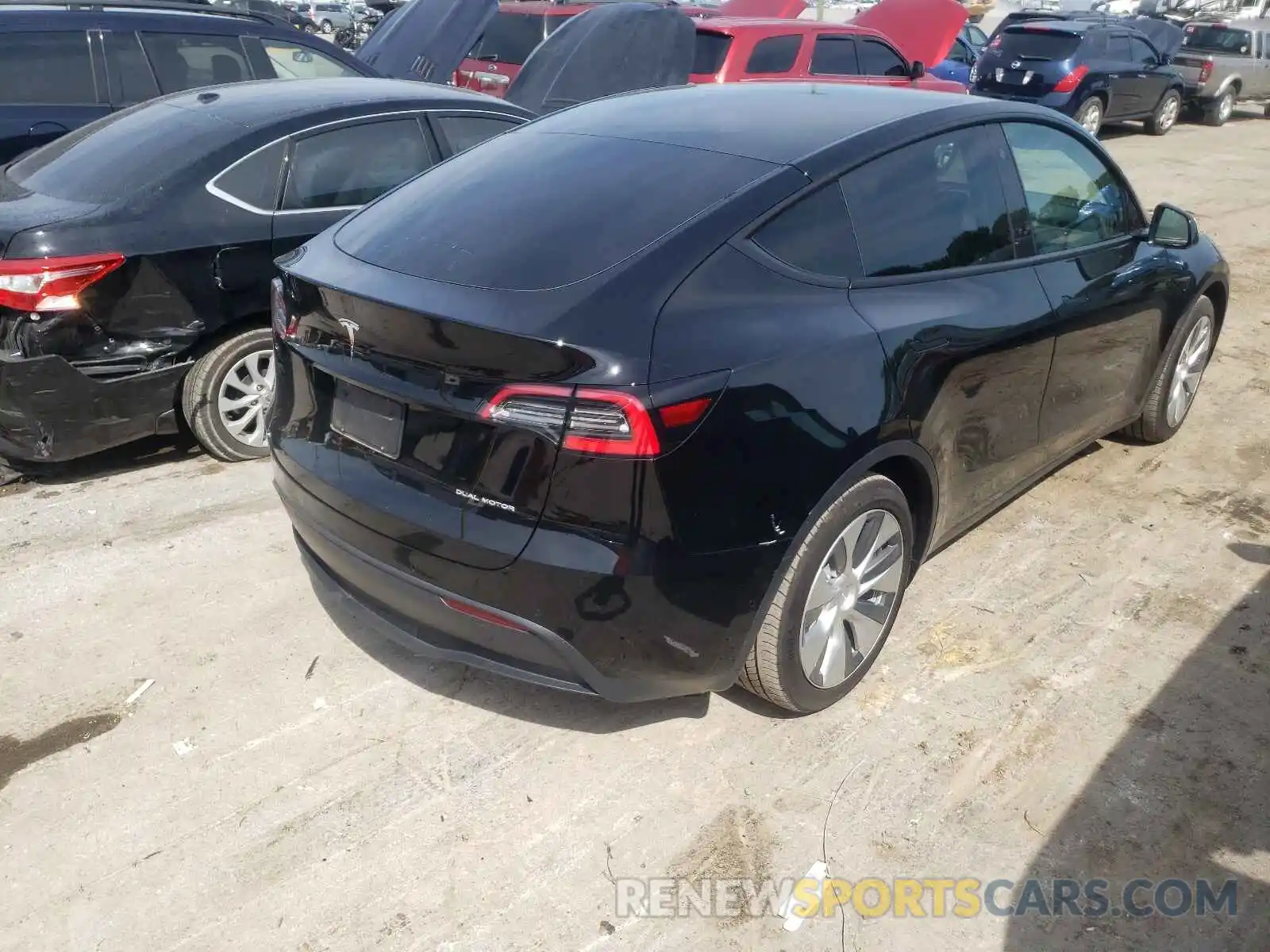 4 Photograph of a damaged car 5YJYGAEE8MF112593 TESLA MODEL Y 2021