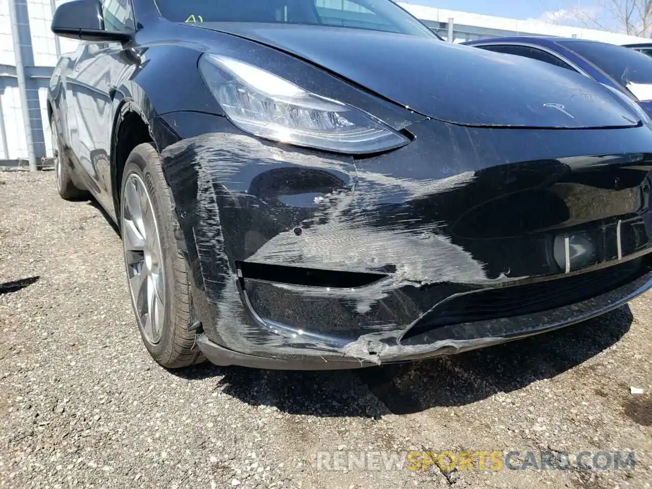 9 Photograph of a damaged car 5YJYGAEE8MF112612 TESLA MODEL Y 2021