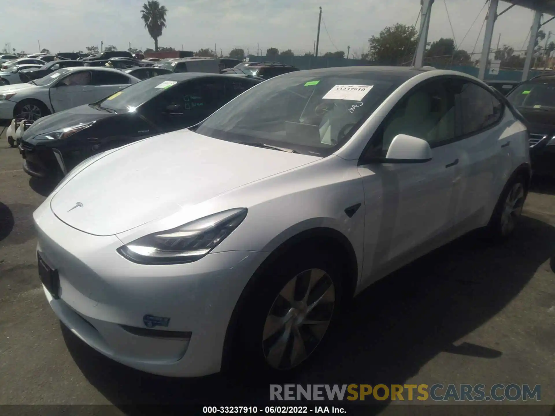 2 Photograph of a damaged car 5YJYGAEE8MF153905 TESLA MODEL Y 2021