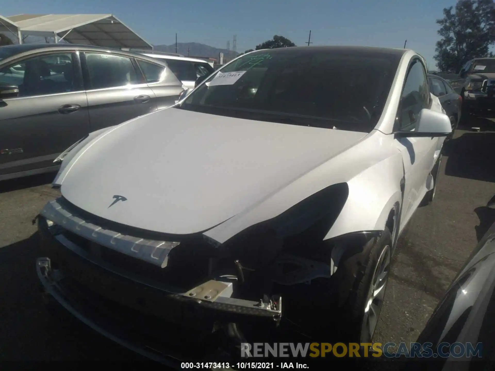 2 Photograph of a damaged car 5YJYGAEE8MF179758 TESLA MODEL Y 2021